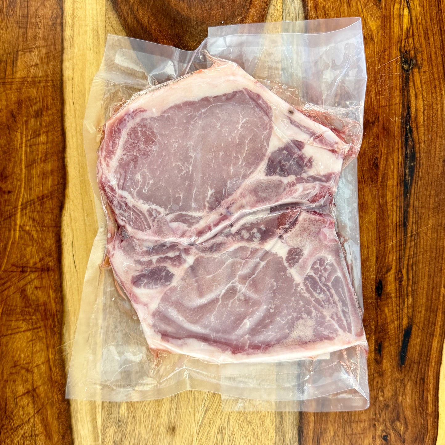 Bone-in pork chops, 2-pack, from Fertile Acreage Farm.
