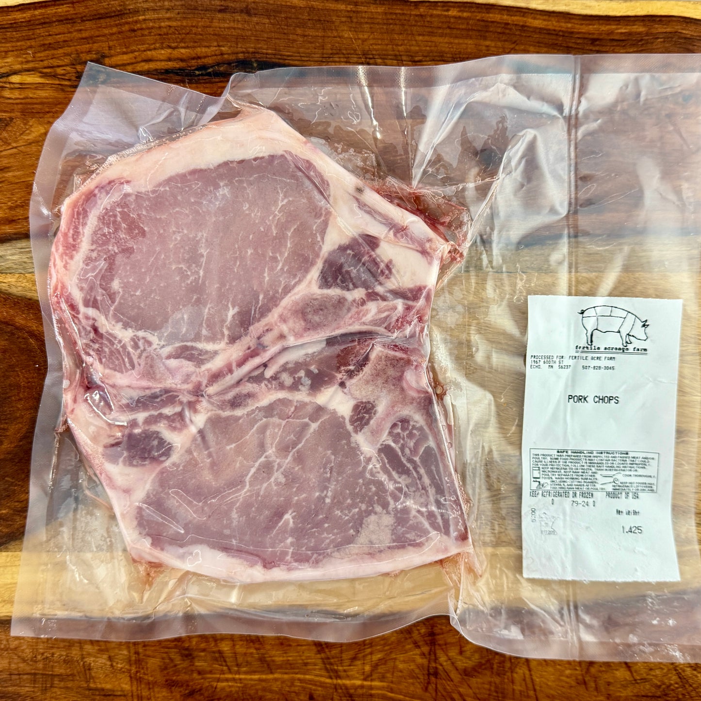 Bone-in pork chops, 2-pack, from Fertile Acreage Farm.
