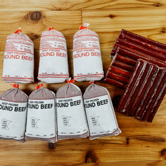 The Dry-Aged Burger and Beef Stick Box from Backstreet Market featuring 7 pounds of dry-aged ground beef and 3 packs of dry-aged all-beef snack sticks.