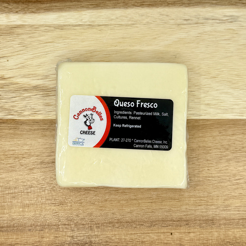 Contents of the CannonBelles Cheese Curds and Queso box, including queso fresco cheese, dill cheese curds, white cheddar cheese curds, and ranch cheese curds. 