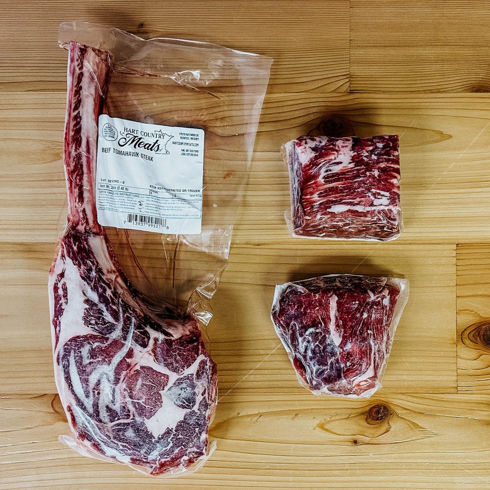 Contents of The Executive Box from Hart Country Meats, including 2 Filet Steaks, and 1 Tomahawk Steak