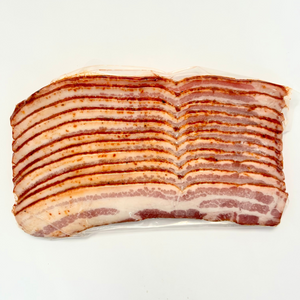 A package of raspberry chipotle flavor bacon strips from MTRY  & CO on a white background