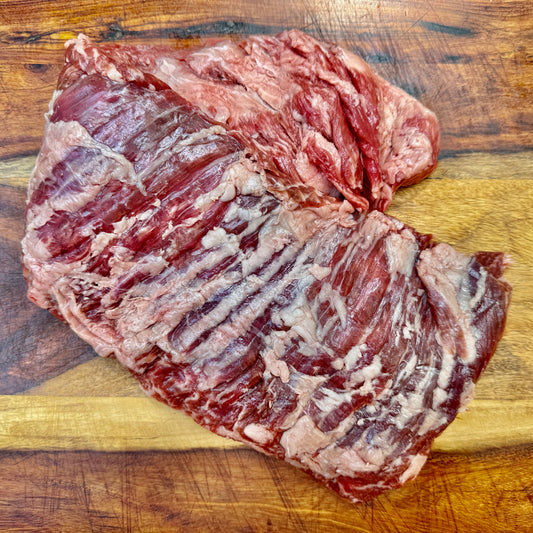 An American Wagyu Skirt Steam from Verlinde Farms on a wooden cutting board